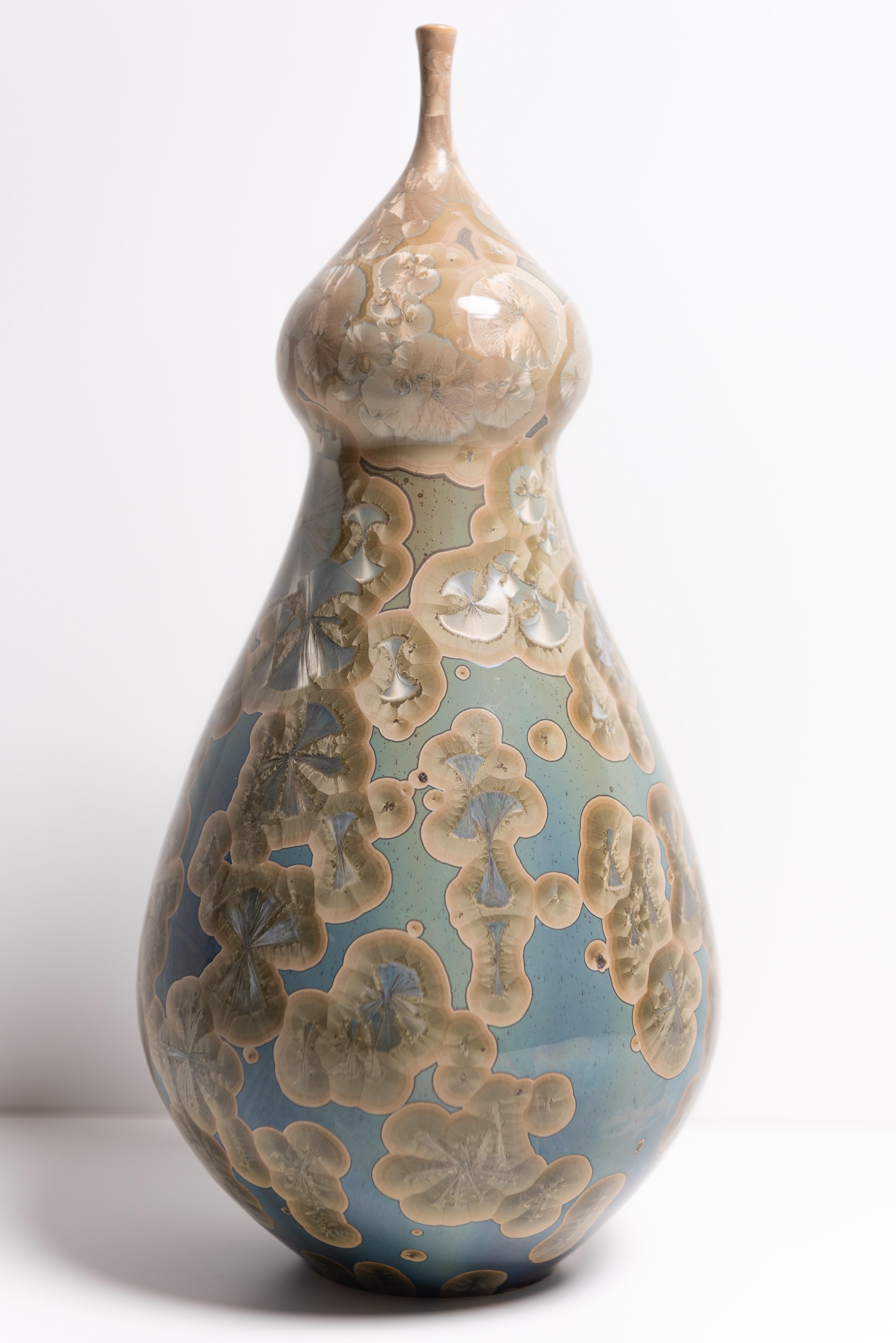 Large handmade gourd-shaped ceramic vase covered in tan and blue zinc silicate crystalline glaze by Brandon Franks